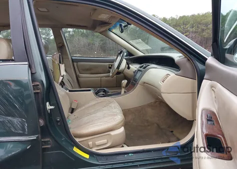 2000 Toyota Avalon Xls z USA, uszkodzony, nr VIN 4T1BF28B5YU030751